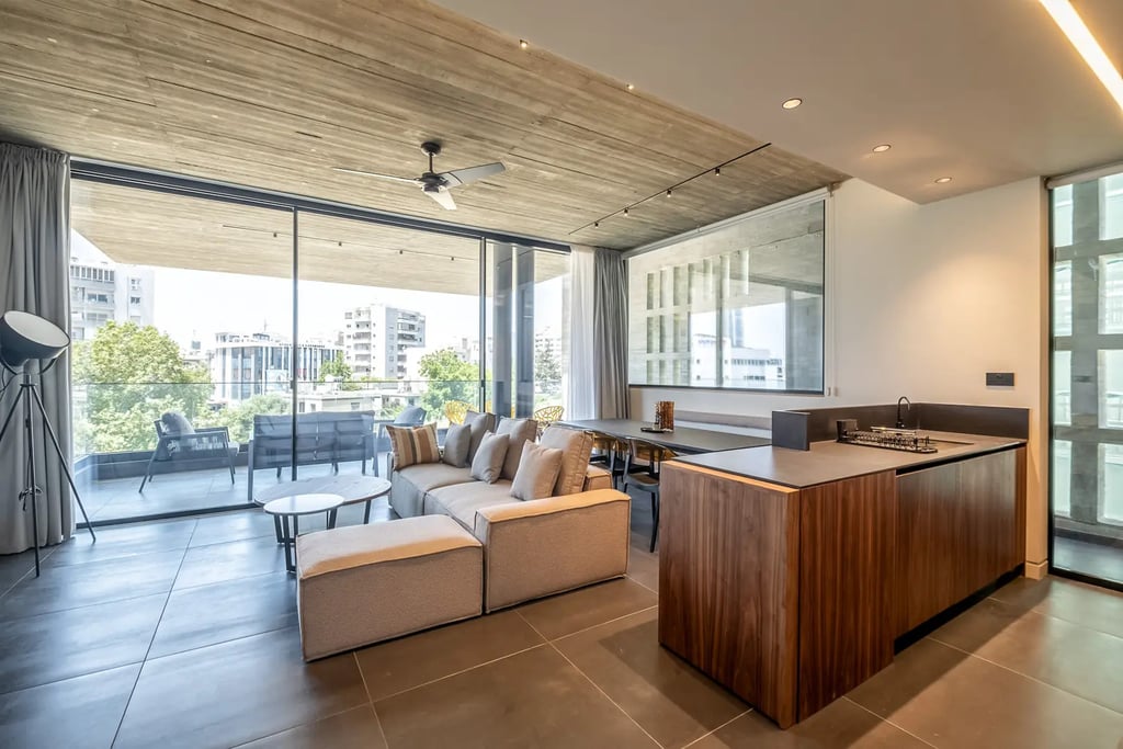 Open-plan premium apartment living space for business guests