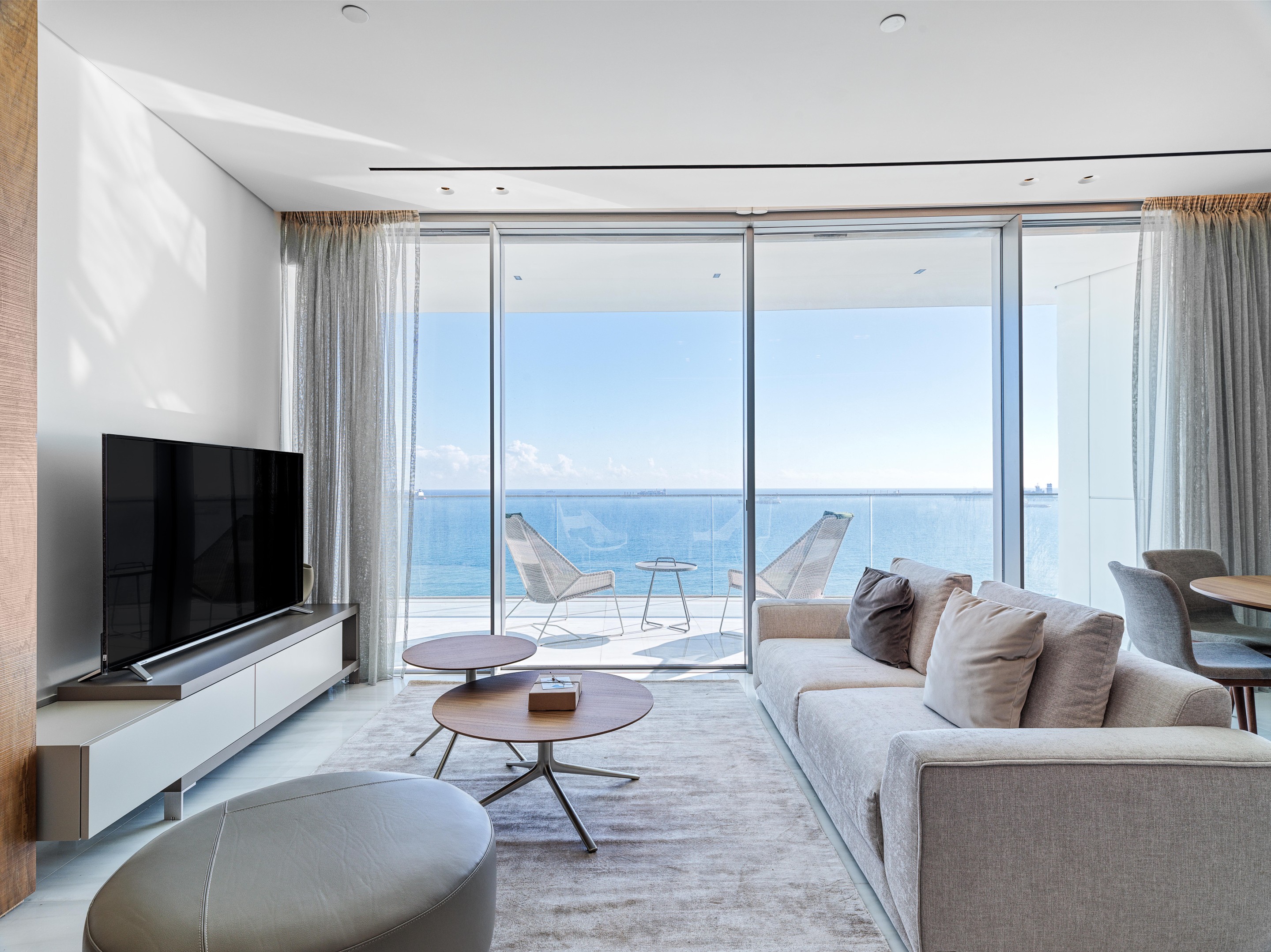 A bright, modern living room representing a home available on Moving Doors